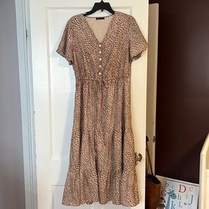 Size large dress purchased on Amazon. Pretty garden brand.